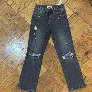 Vervet gray/black womens size 26 jeans. Rips in knees and around the pant.